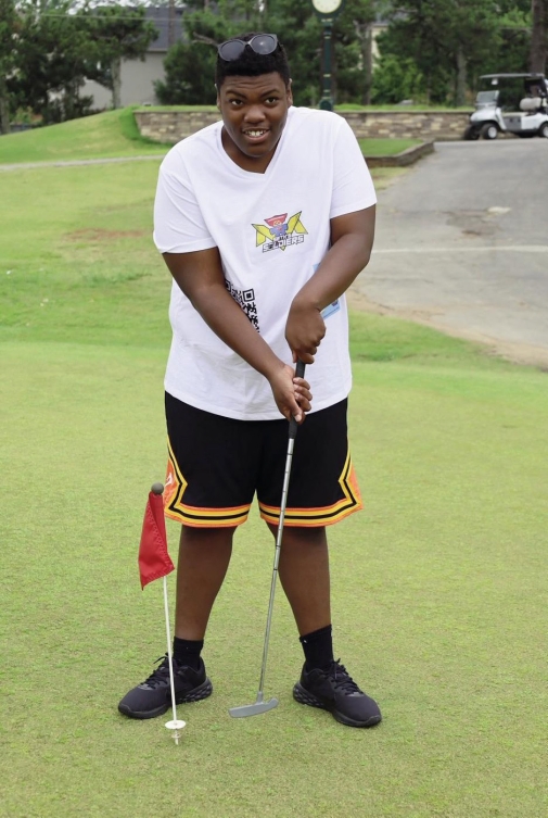 Playing golf with his dad has become a great new hobby for Seth.