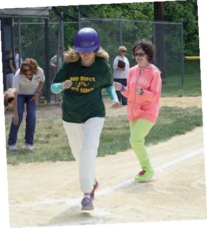 GIRLS PLAYING BASEBALL