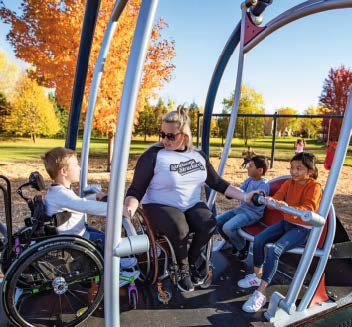 CHILDREN ON ADAPTIVE SWING