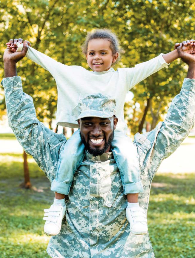 MAN WITH CHILD ON SHOULDERS